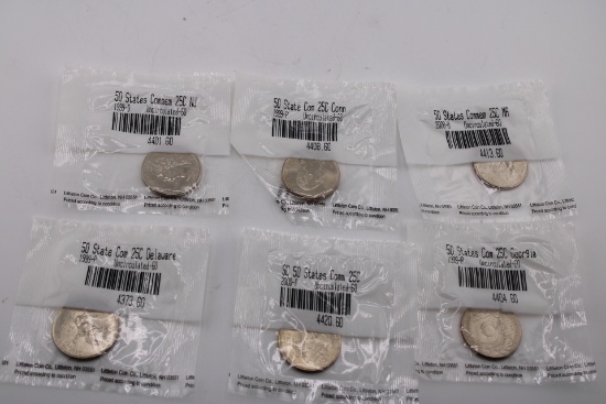 Six Uncirculated Sealed Quarters