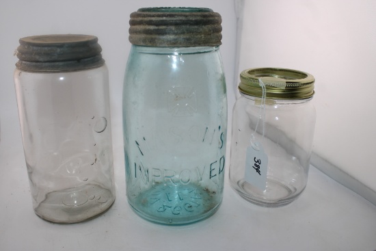 Antique Masons Improved Canning Jar paired with two other antique jars.