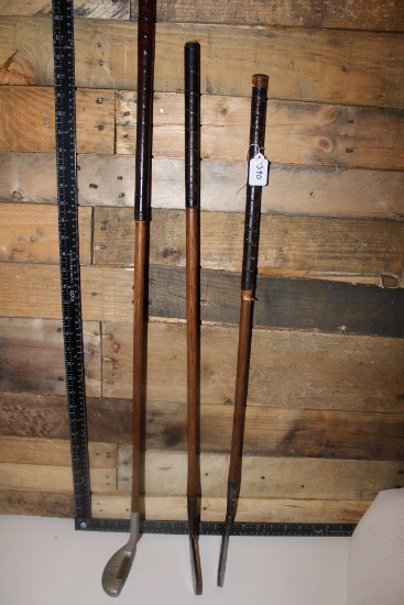 Three Vintage Golf Clubs