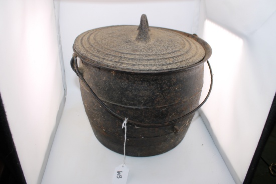 Cast Iron Primitive Pot with lid. 8.75" tall and 11 " in diameter