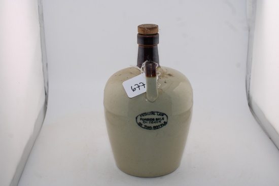 Vintage Stoneware. Federal Law Forbids Sale or Reuse of this bottle with cork. D-296.