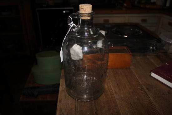White House Vinegar Embossed Jug with cork.