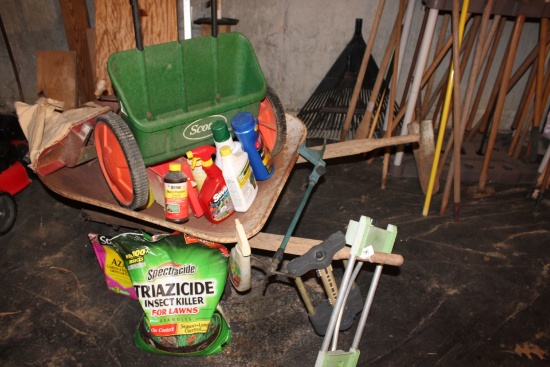 Wheel barrel, spreaders and seed