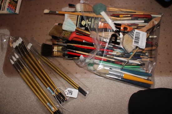 Large collection of paint brushes