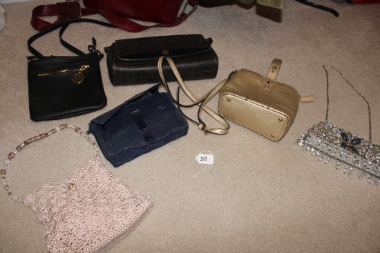 Womens hand bags and purses lot.