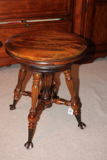 Antique Clawfooted glass piano stool.
