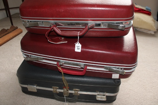Three Vintage Suit cases