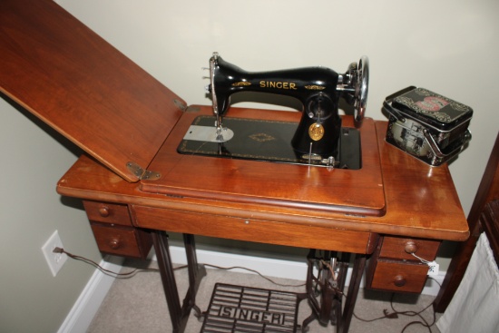 Vintage Singer Sewing Machine and cast stand/desk. Serial  AG792485