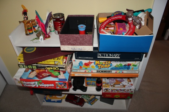 Shelf containing toys, games and other items.
