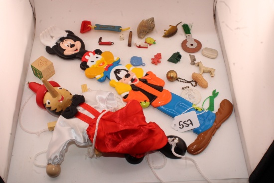 Wooden Pinocchio String Puppet, Disneyland back scratcher and other trinkets.