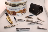 Tin can full of finger nail clippers.