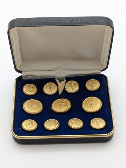 Lot of 11 Gold Tone Buttons in Case