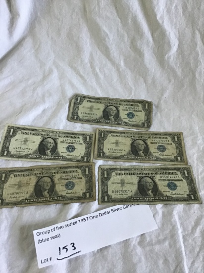 Group of five series 1957 One Dollar Silver Certificates BLUE SEAL