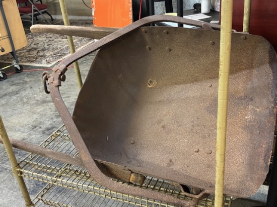 Antique, horse-drawn dirt scoop