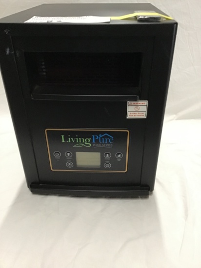 Barely used ceramic space heater with remote