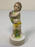ANTIQUE FRENCH PORCELAIN FIGURINE