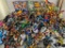 Huge Lot of Assorted Action Figures and Toys Including Transformers and Space Jam