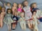 Large Plastic and Rubber Dolls in Various Outfits
