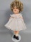 Ideal Shirley Temple Doll with Blonde Curls in White Dress