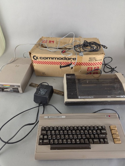 Commodore 64 System with Power Supply VIC-1541 MP 801 and Manuals