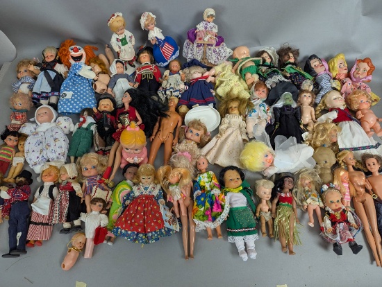 Plastic and Vinyl Dolls in Various Styles and Attire