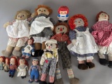 Collection of Raggedy Ann and Andy Dolls in Various Sizes and Styles