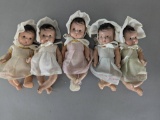 Lot of Five Composition Baby Dolls with Bonnets and Dresses