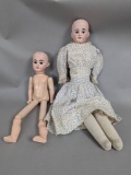 2 Bisque Head Dolls with Jointed Bodies and Clothing