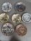 Seven Japanese Porcelain Plates with Hand-Painted Scenes