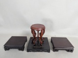 Four Chinese Wooden Stands Crafted with Curved and Square Designs