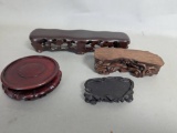 Four Hand Carved Wooden Display Stands in Various Forms