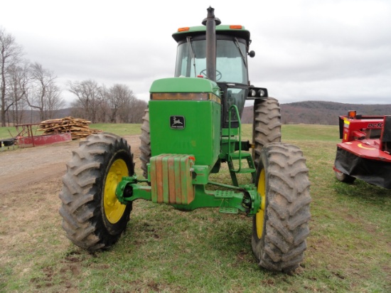 JD 4450 4 WD diesel tractor with a cab