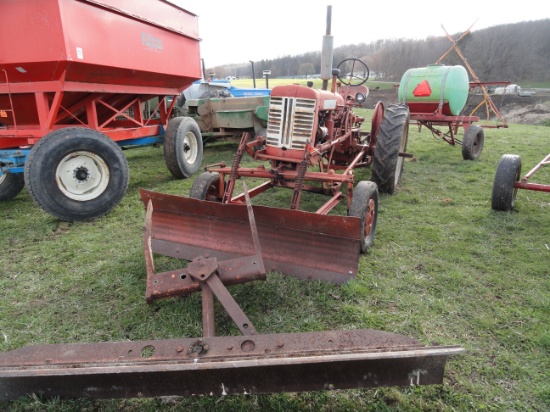 Farmall tractor with snow plow, back blade and 2btm plow