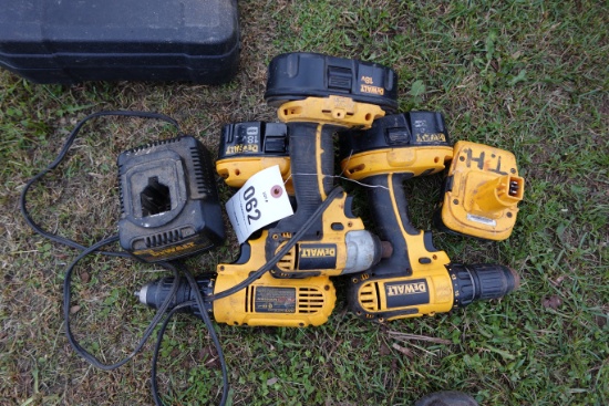 3 Dewault tools with charger and battery.