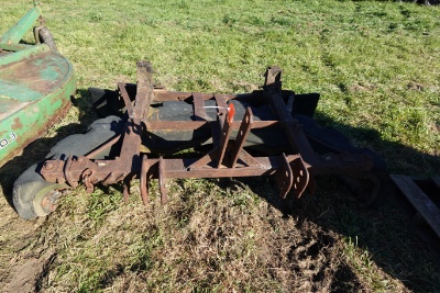 Rubber stall scrapper