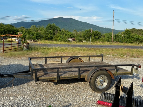 Tag # 2168  5 x 10 utility trailer, sells with a pintle hitch