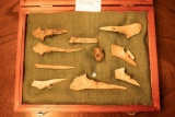 A Frame of Bone Artifacts that Includes a Pipe with a Section of the Stem