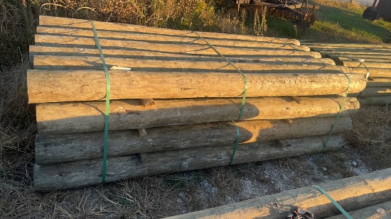 24 7"x9’ Treated Wooden Post