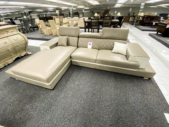 Modern leather grey/ cream color sectional with left facing chaise