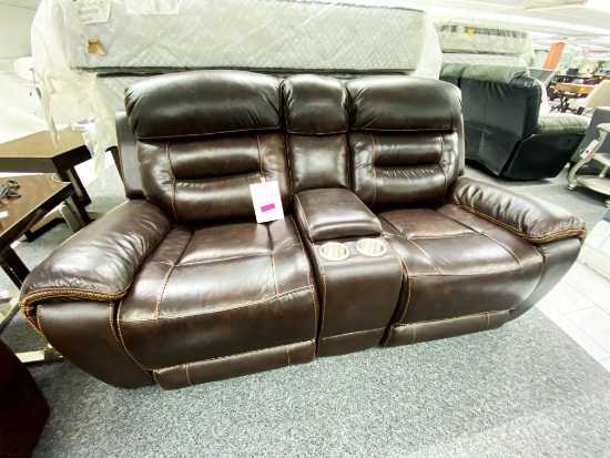 Brown leather loveseat with center storage console, 2 cupholders