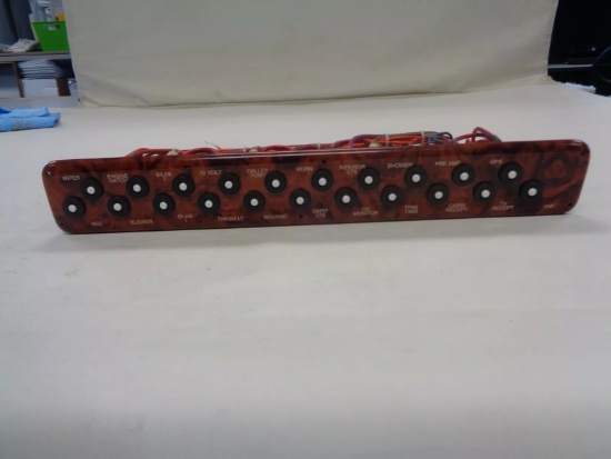 Rinker 250 plastic woodgrain push to reset breaker panel, part number 46178