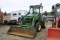 John Deere 4320 tractor with front bucket