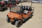 Orange Club Car 4 passenger golf cart