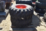 Pair of Titian trac loader tires with Kubota rims
