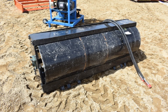 Vibratory roller skid steer attachment