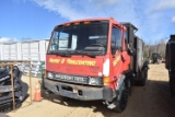 1990 Mitsubishi Fuso truck equipped with sealcoating tank, white