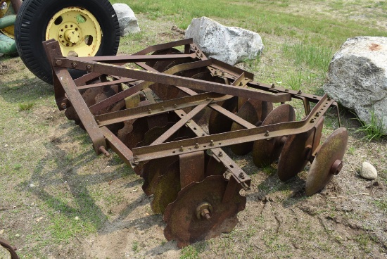Disc harrow attachment