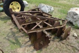 Disc harrow attachment