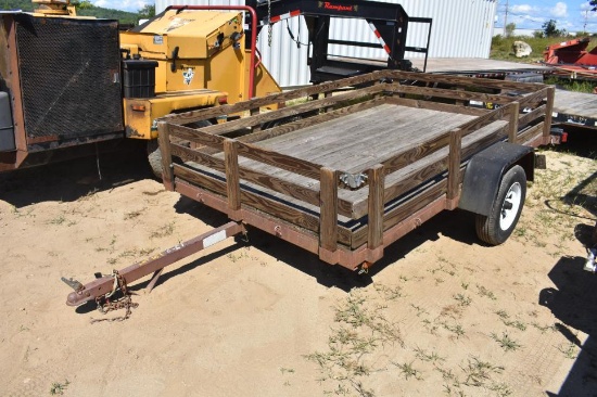 2000 Carmate 6' by 10' tilt utility trailer
