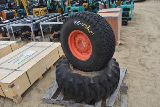 2 Kubota tires on rims, unmatched tread